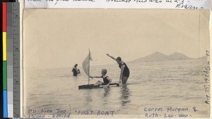 Ruth and Carrel Morgan sailing a small boat near Hsi Lien Tao Island, China, 1926