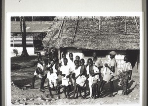 Manyemen. Schoolboys playing in front of their dormitory