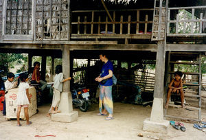 Ellen Skov Birk, FDF Team, at typically big house on piles