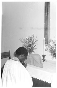 ELCT, Karagwe Diocese, Tanzania. From Nyakahanga Church with the Pastor praying at the Altar