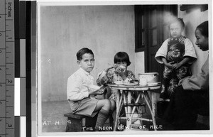 Students eating a meal, Hong Kong, China, ca. 1930