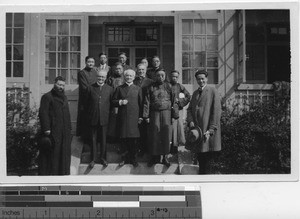 Bishop and priests at the home of Mr. Lo at Shanghai, China