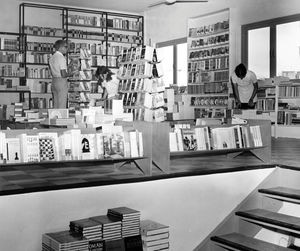 Interior from Bahrain Family Bookshop, 1973 in the background Missionary, Bookseller Jørgen Fru