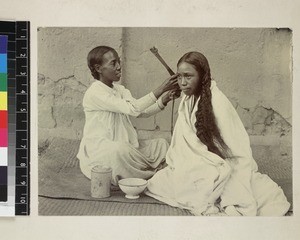 Women dressing hair, Madagascar, ca. 1900