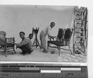 Workers weaving furniture at Shantou, China