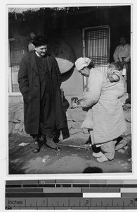 Father Mooney meets Korean family in Anshu, Korea, ca. 1930-1939