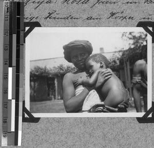 Xhosa woman with a sick child, Baziya, South Africa East