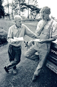 Head of the Building Department, ELCT, Karagwe Diocese, Henning Dammeyer (left) discussing a bu