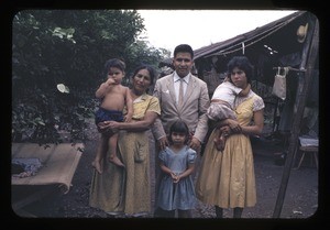 Family outside their home