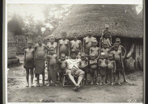 Chief Ajwe, the successor to Sona, in Nyasoso, with his wives and children