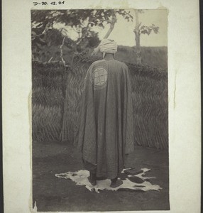 A Hausa priest in Winnebah at prayer, facing Mecca, and standing on a skin