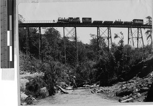 Train stopped on a bridge, Uganda, Africa, July 24, 1909