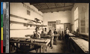 Clergy and men inside a workshop, Kakyelo, Congo, ca.1920-1940