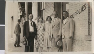 S. K. Dong with G. H. P. Showalter and group in front of the offices of the Firm Foundation Publishing House, Austin, Texas, ca. 1940s