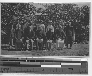 Fr. Paulhus with men and boys at Shangyang, China, 1924