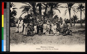 Missionary sisters standing with young girls, Algeria, ca.1920-1940