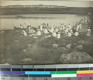 Leprous women washing their clothes in the pond, Mangarano, Madagascar