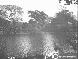 African man standing on the bank of the Great Usutu, Mozambique, ca. 1896-1911