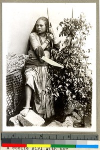 Girl picking tea leaves, Vārānasi , India, ca. 1920