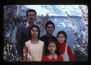 Family outside their home