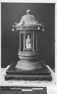 Pagan statue in a temple at China, 1938