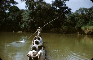 Men in pirogue, Mbam river, Centre Region, Cameroon, 1953-1968