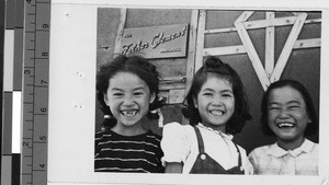 Three young girls at Colorado River Relocation Center, Poston, Arizona, ca. 1945
