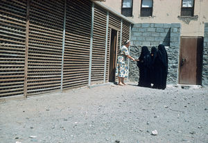 Missionary Karen Olsen welcoming local women to the womens meeting in Crater, Aden