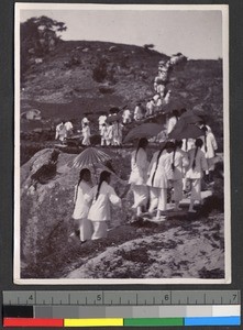 Students walking along a hilly trail, Shantou, Guangdong, China, ca. 1920-1937