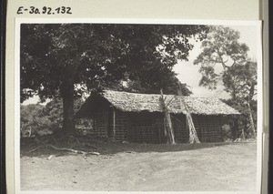 A small resting house in the church compound in Bakumba. Palm leaves have been put up to celebrate the occasion