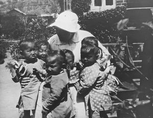 Manchuria, the 1930s. From the orphanage in Antung. Karen Gormsen with some of the children. Nu