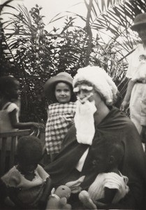 Missionary dressed as Santa Claus, Nigeria, 1938