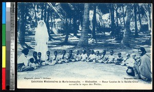 Children eating with a nun and two women, Hindustan, India, ca.1920-1940