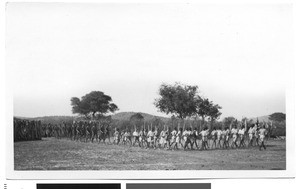 Marching schoolchildren at the coronation celebration, Ramotswa, Botswana, 1937