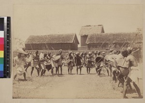 Group of men performing ritual dance, Madagascar, ca. 1900