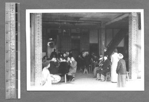 Restaurant or eating area with people eating at tables, Tibet, China, ca.1941