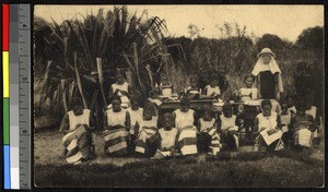 Machine and hand sewing at the mission, Congo, ca.1920-1940