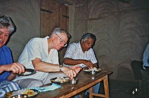An Evangelist (governor) and Kurt & Johanne Maria Petersen eating together, in the conventional