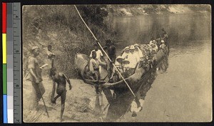 Canoe carries goods and missionaries on the Itimbiri River, Congo, ca.1920-1940