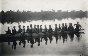 Pupils in a pirogue, in Gabon