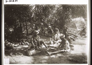 Krobo women pounding palm-nuts