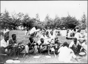 Seminarists of the teachers' seminar in Marangu having a meal, Tanzania, ca. 1927-1938