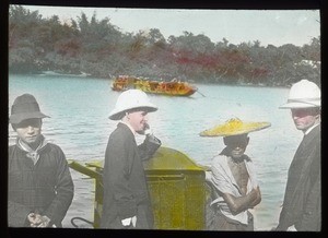 Maryknoll Fathers James E. Walsh and Daniel McShane riding in a boat, China, ca. 1918-1938