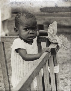 Baby in cot, Nigeria, ca. 1938