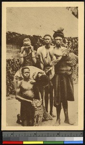 Men pose with two leopards, Congo, ca.1920-1940