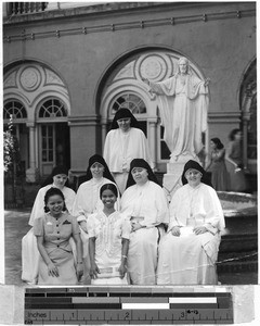 Group portrait of Maryknoll Sisters with two class of 1931 nursing school graduates, St. Paul's Hospital , Manila, Philippines, April 13, 1940