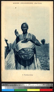 Man playing drum, Ouagadougou, Burkina Fasa, ca.1920-1940