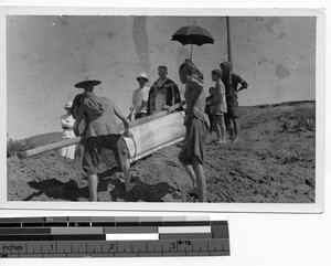 Fr. North conducting a funeral at Dongzhen, China, 1938