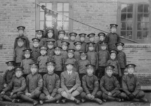 Boy School students in Sweihwafu with teacher Wang in the middle