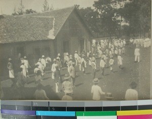 School boys doing exercises in a schoolyard, Antsirabe, Madagascar, ca.1915